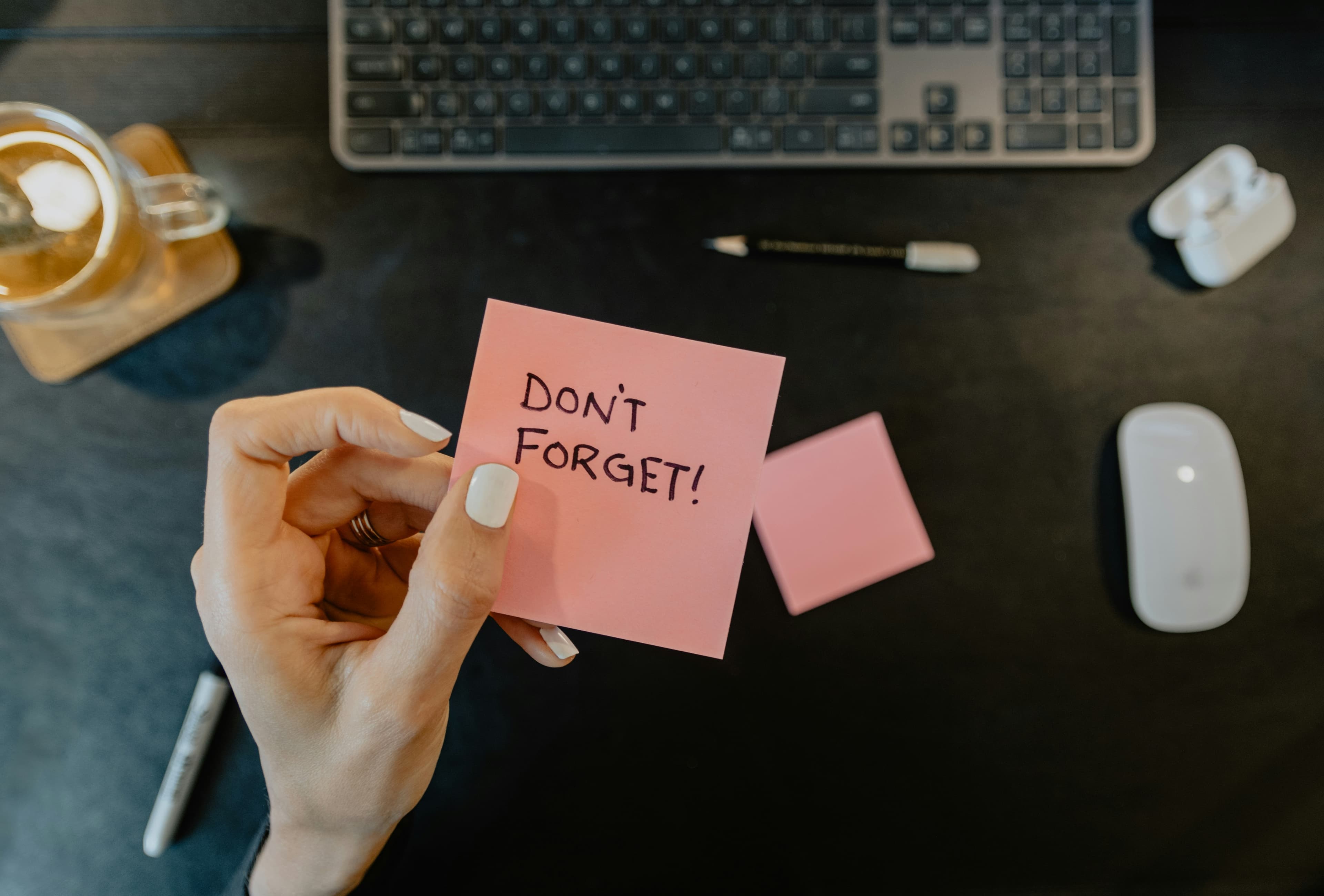 Freelancer managing payment reminders and invoices on laptop